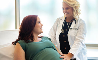 prenatal nurse and patient